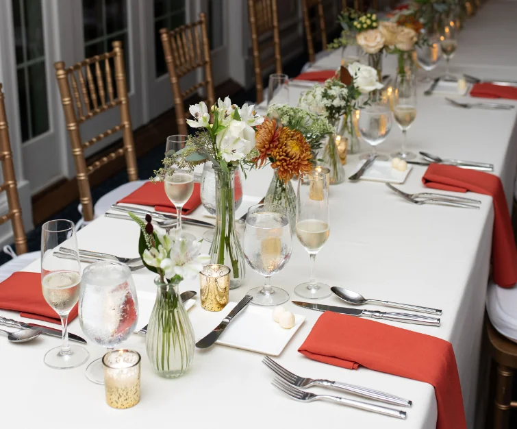 Event table with drinks and silverware