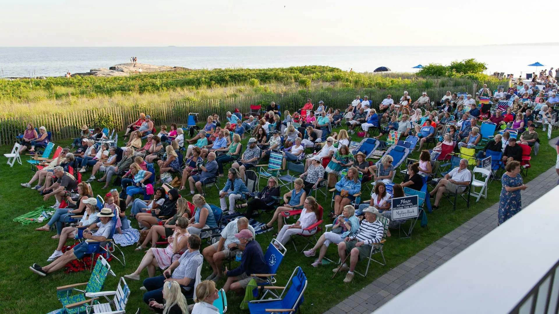people listening to concert at Madison Beach Hotel