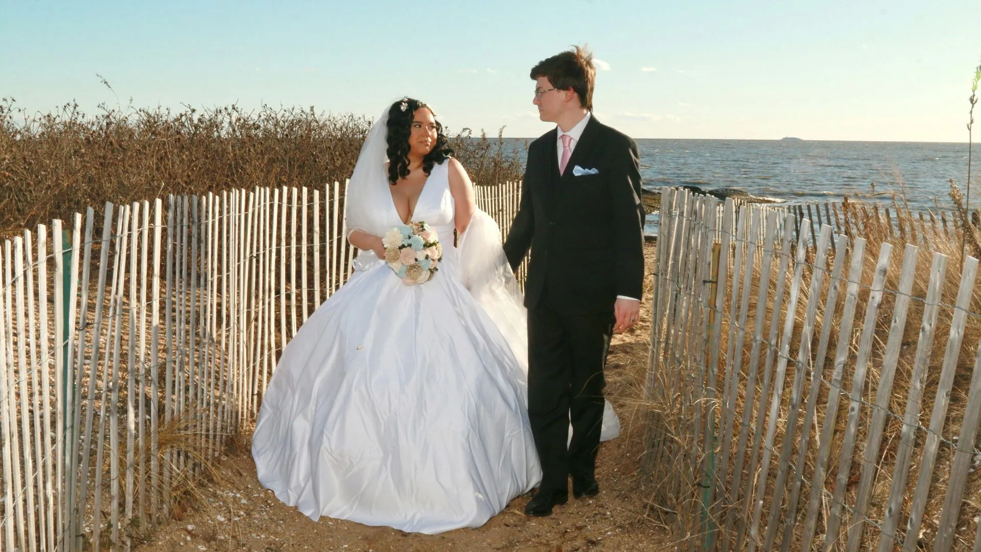 couple on sandy path at madison beach hotel